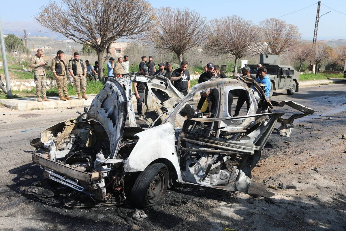 A vehicle targeted by an Israeli airstrike is seen in the town of Borj El Mlouk, Nabatieh governorate, south of Lebanon on March 15 2025. [Ramiz Dallah - Anadolu Agency]
