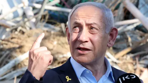 Reuters Prime Minister Benjamin Netanyahu visits a site in Israel hit by Iranian missiles