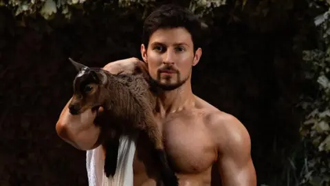 Pavel Durov/Instagram Tech billionaire Pavel Durov poses shirtless with a brown goat on his right shoulder.