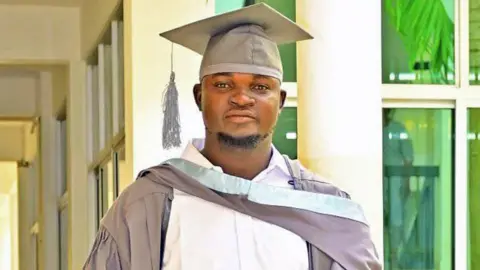 Albert Ojwang / Facebook Albert Ojwang pictured at his graduation in a grey cloak and mortarboard