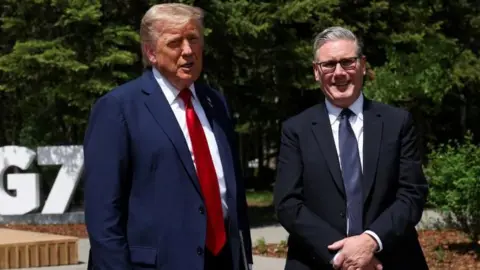 PA Media US President Donald Trump (left) and Prime Minister Sir Keir Starmer speaking to the media at the G7 summit in Kananaskis, Alberta, Canada.