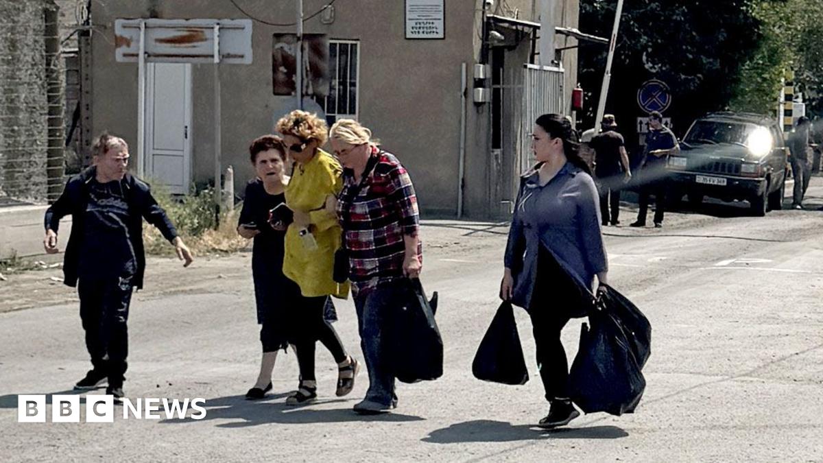 Talk of regime change resonates with Iranians fleeing across border