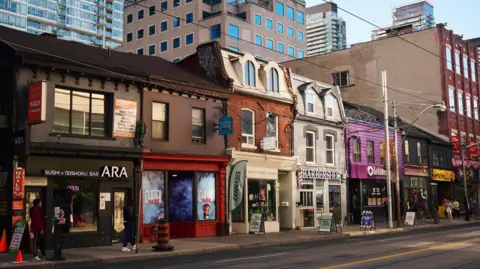 Getty Images A view of the shopfront on Queen Street in Toronto