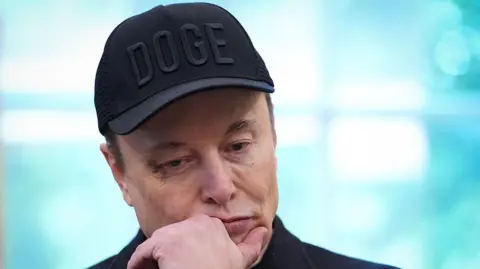 Getty Images A pensive looking Musk