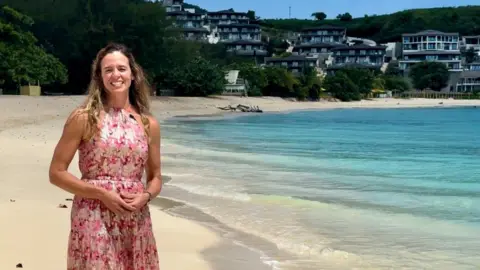 Nadia Dyson Nadia Dyson, owner of estate agency Luxury Locations, smiles at the camera as she stands on a beach in Antigua