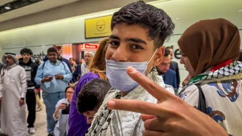 BBC Majid arriving at Heathrow airport