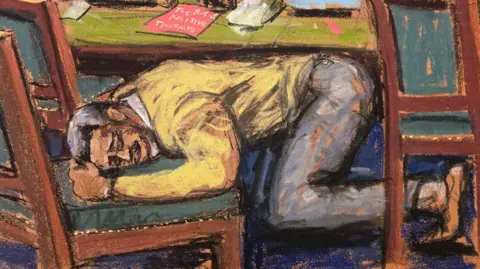 REUTERS/Jane Rosenberg Court sketch of Sean Diddy Combs kneeling on the floor with his head in a chair after learning verdict