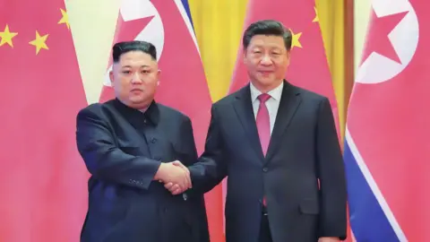Getty Images Kim Jong un and Xi Jinping