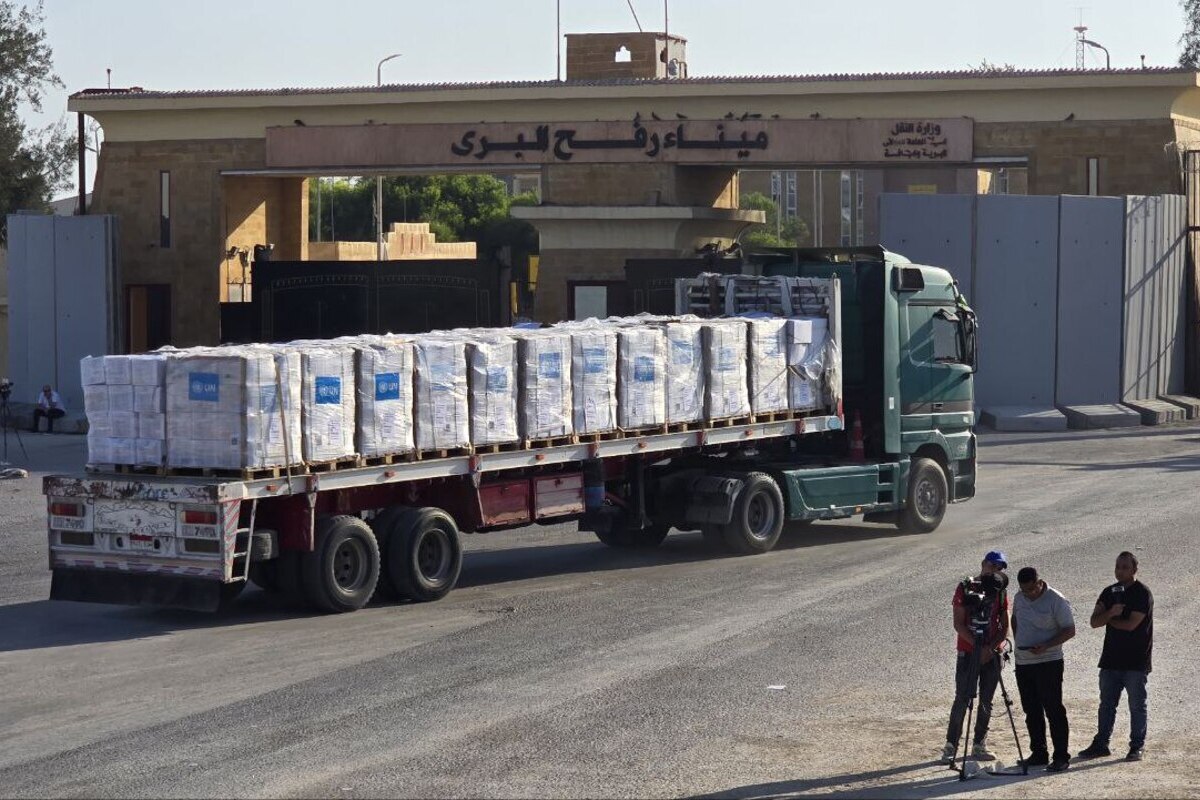 Limited number of aid trucks carrying essential supplies are allowed to pass through the Rafah Border Crossing into the Gaza Strip, as the humanitarian crisis in Gaza continues on August 03, 2025, in Rafah, Egypt. ([hmed Sayed - Anadolu Agency]