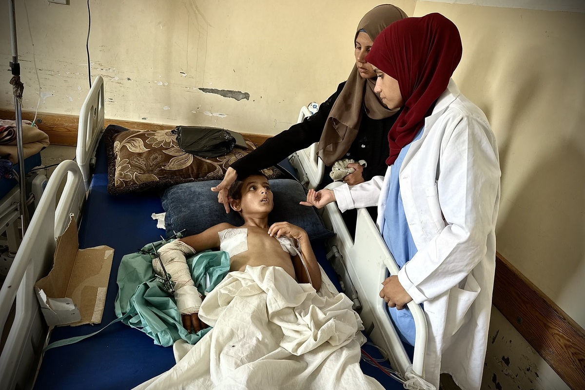 11-year-old Musa al-Shaer lies on a hospital bed at Nasser Hospital on August 13, 2025 in Khan Yunis, Gaza, after being injured while going to collect food from humanitarian aid point in Rafah, southern Gaza. [Doaa Albaz - Anadolu Agency]