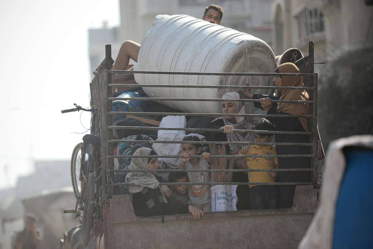 Hundreds of Palestinians takes the road with whatever belongings they could carry to seek refuge in safer areas as they are once again forced to flee from north of the Gaza Strip as the Israeli army stepped up its attacks, putting its occupation plan into action in Gaza City, Gaza on August 26, 2025. [Abdalhkem Abu Riash - Anadolu Agency]