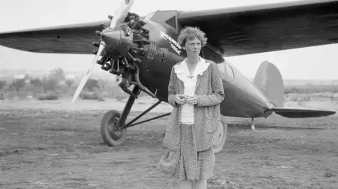 Getty Images Amelia Earhart at Long Beach, Ca, with her plane