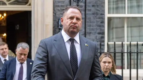 Getty Images Andriy Yermak walks out of 10 Downing Street after a meeting of the Coalition of the Willing in October 2025