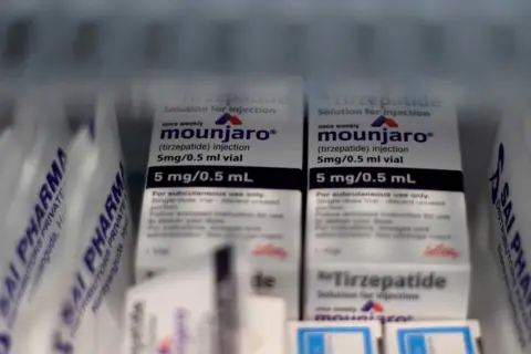 Reuters FILE PHOTO: Vials of Eli Lilly's Mounjaro, a tirzepatide injection drug used for treating type 2 diabetes and weight loss, are seen in a fridge at a health clinic in Hyderabad, India, April 14, 2025. REUTERS/Almaas Masood/File Photo