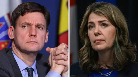 Getty Images A composite image of David Eby of British Columbia and Danielle Smith of Alberta. Both are photographed at news conferences, looking left of the camera with a serious expression. 