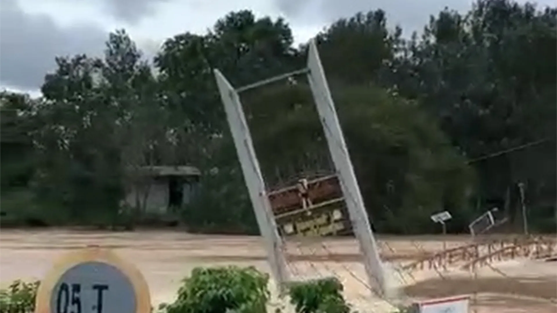 Video shows the moment a bridge is swept away by floodwaters in Vietnam | Floods