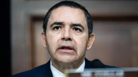 Getty Images A close photo of Henry Cuellar, who wears a dark suit and white shirt