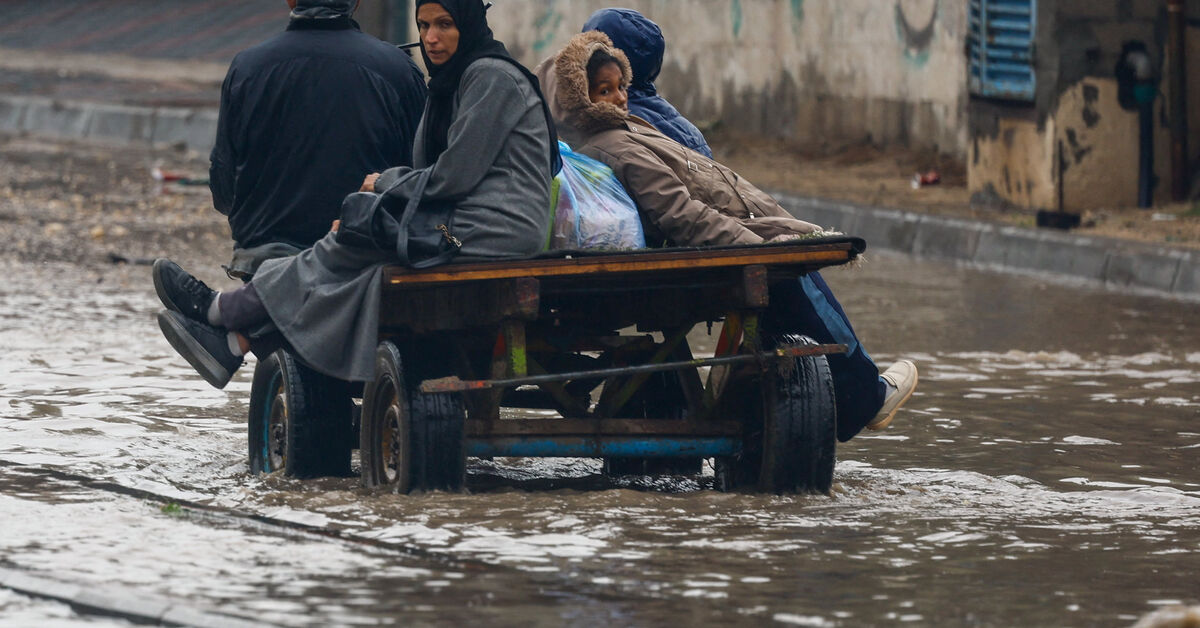 Rain has flooded Gaza tents and a baby died of exposure, medics say