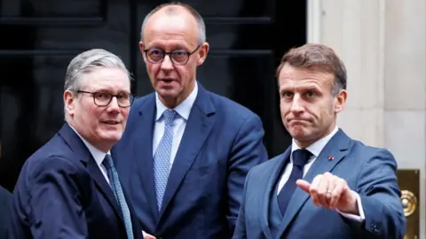 EPA/Shutterstock British Prime Minister Keir Starmer, German Chancellor Friedrich Merz and French President Emmanuel Macron in London. Photo: 8 December 2025