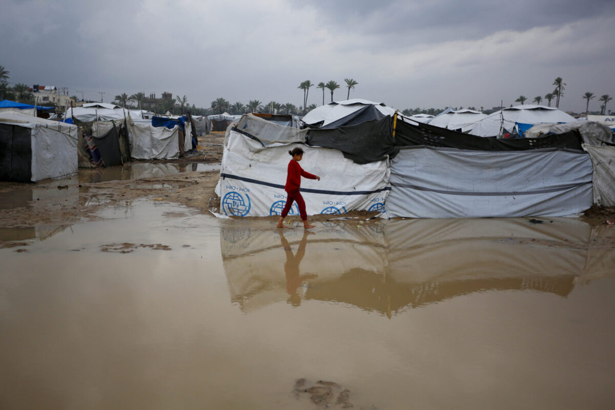 Palestinians struggle with flooding after heavy rain hits the Deir al balah, Gaza on December 12, 2025. [Mohammed Nassar - Anadolu Agency]