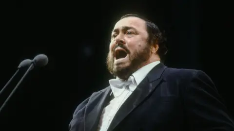Getty Images Italian tenor Luciano Pavarotti singing in Beijing, China, July 1986.