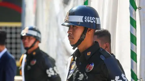 Getty Images Cambodian military police officers stand guard 