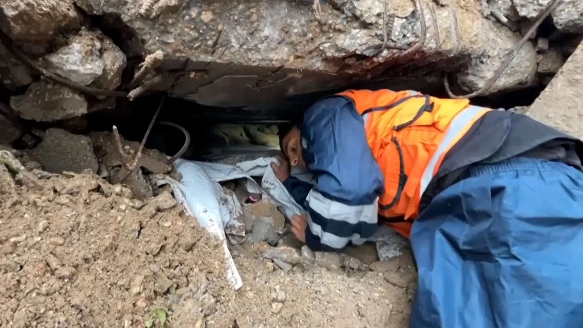 Palestinians trapped under storm-collapsed buildings in Gaza | Gaza