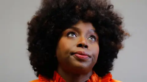 EPA Head and shoulders portrait of popular Nigerian author Chimamanda Ngozi Adichie looking slightly left of camera against a grey background, taken during an interview at the 39th Guadalajara International Book Fair (FIL) in Guadalajara, Mexico in December.