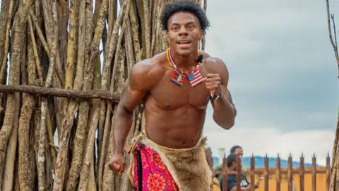 Eswatini Tourism US YouTuber IShowSpeed prepares to run as he takes part in an initiation ceremony to become a warrior in Eswatini - January 2026.