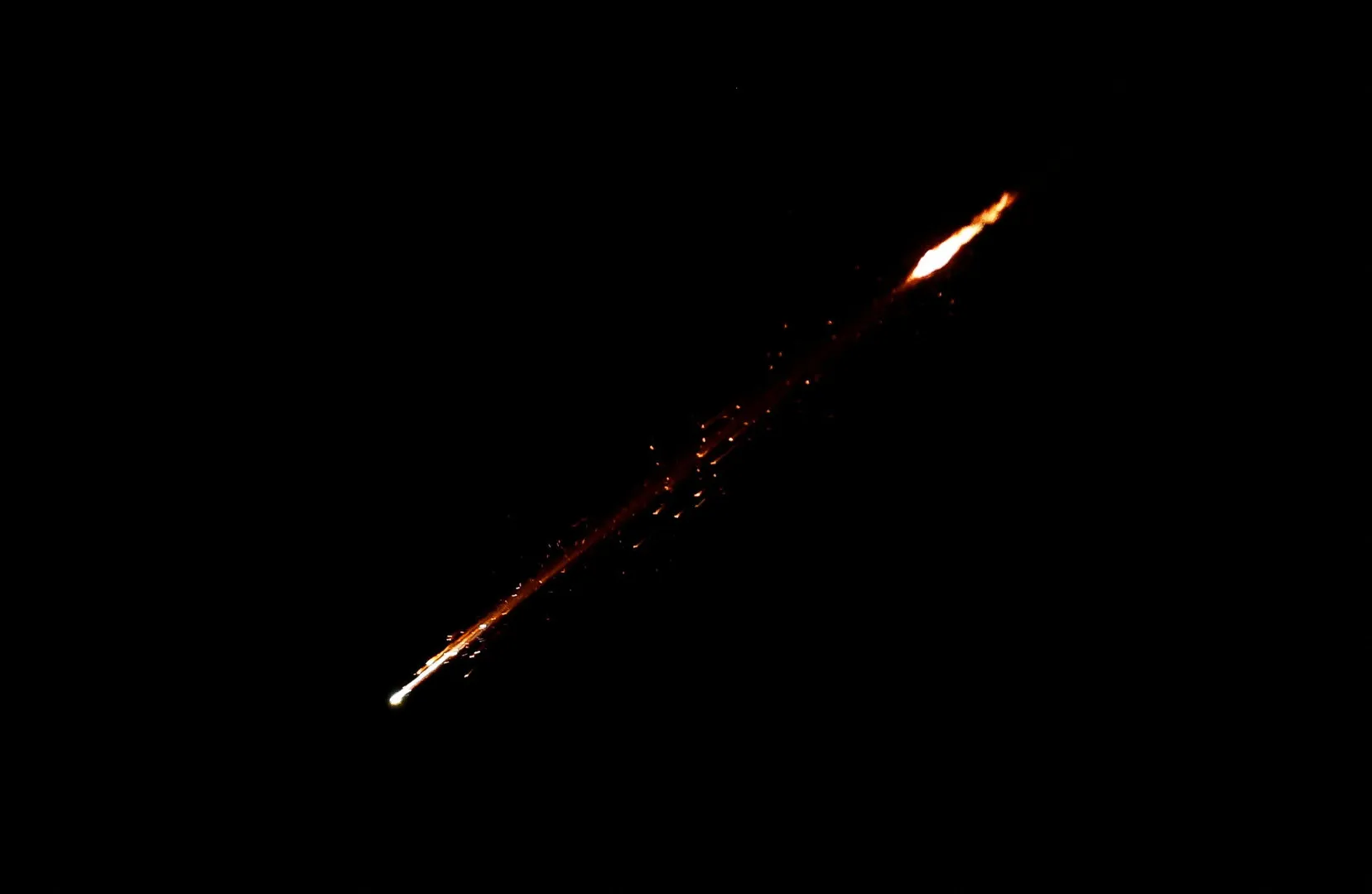 Iranian missiles, interceptions seen over Israel