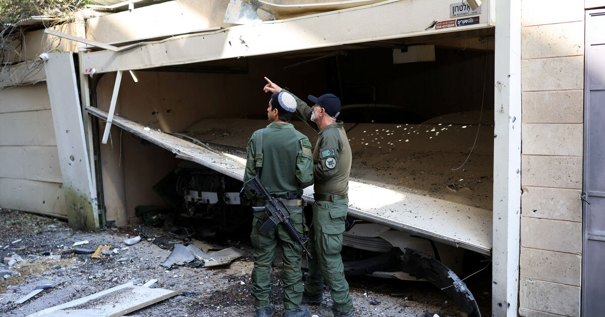 Israeli military says Iranian missiles hit central Israel