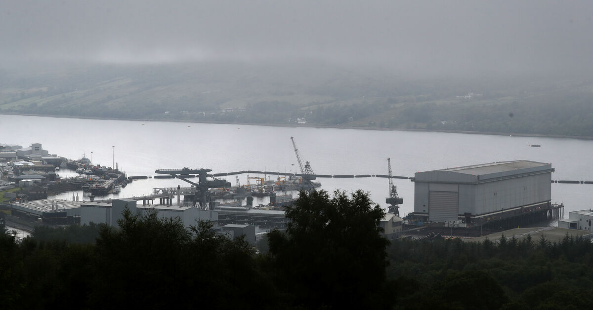 Iranian man, Romanian woman charged over attempt to enter UK submarine base