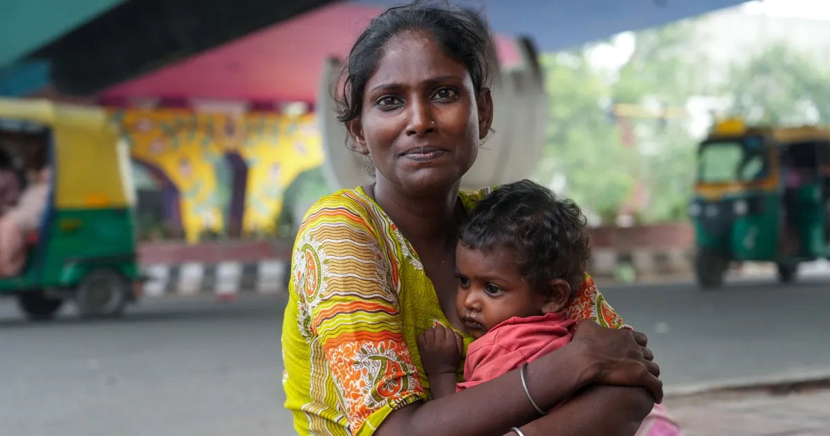 ‘I count their breaths’: A homeless mother protects her children in Delhi | Women