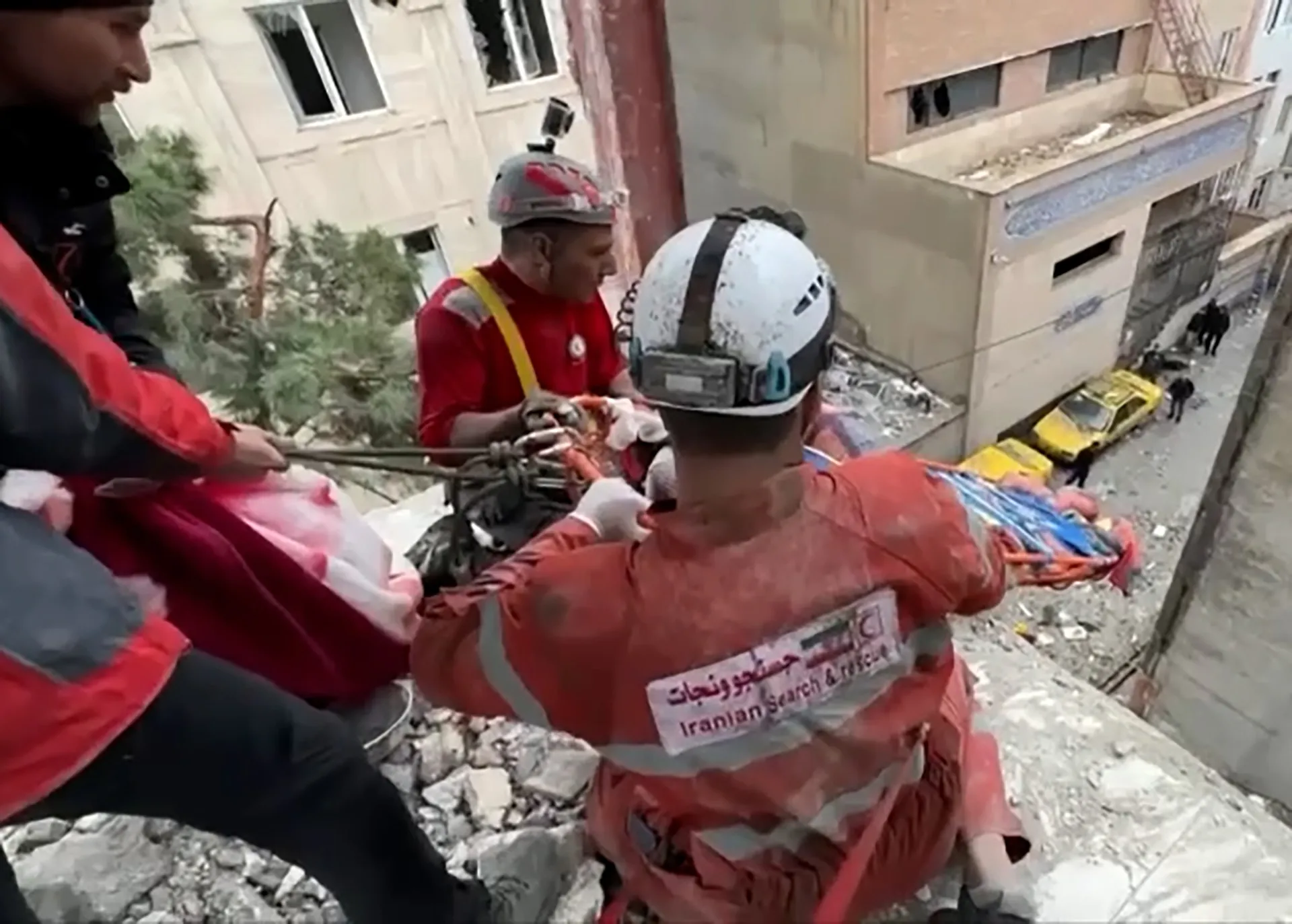 First responders rescue man from Tehran building hit by air strike | US-Israel war on Iran
