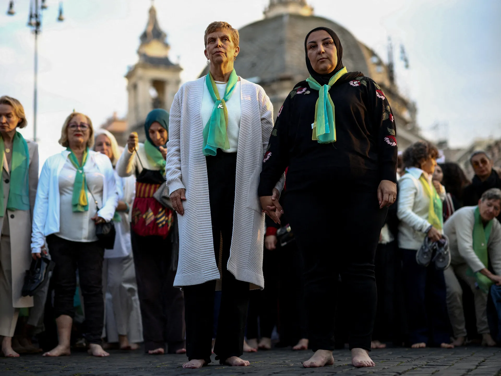 Israeli and Palestinian mothers call for peace on barefoot walk | Child Rights