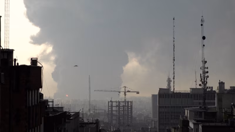 Tehran Skyline Blanketed In Smoke Following Strikes On Oil Facilities