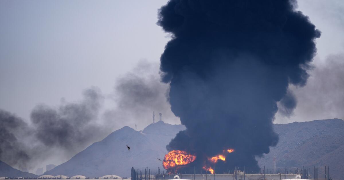 Tehran threatens Middle East’s busiest port as Iran war enters its third week