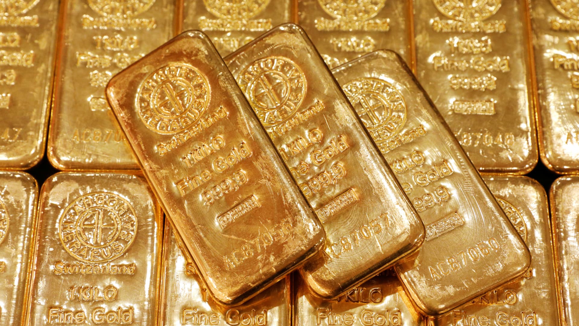 Gold eases on firmer dollar as investors await clarity on U.S.-Iran talks