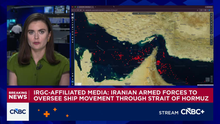 Iran says talks continue while it retains control of Strait of Hormuz