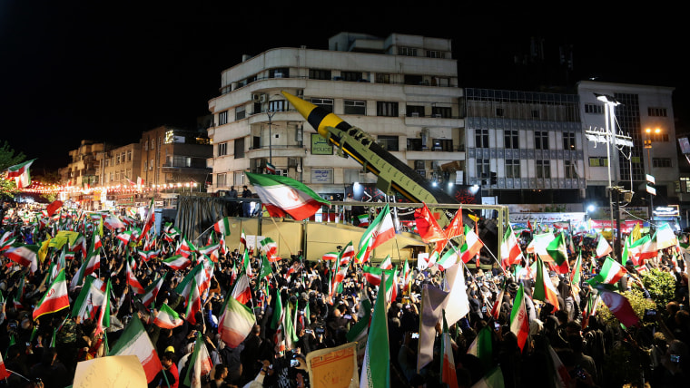 Iran displays apparent ballistic missile at Tehran rally