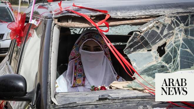 In war‑scarred Gaza, brides turn to refurbished wedding dresses