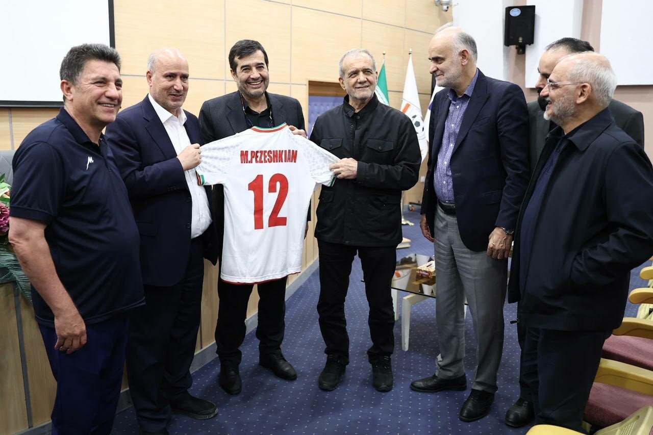 Pezeshkian presented with Iran No. 12 shirt