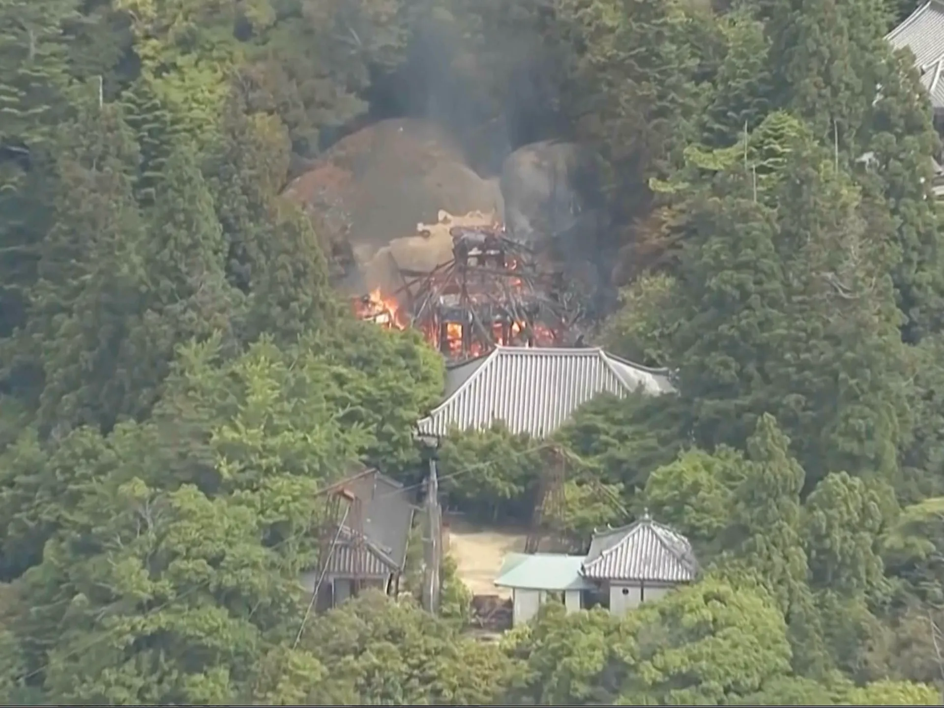 Buddhist hall housing ‘eternal flame’ burns down in Japan | News