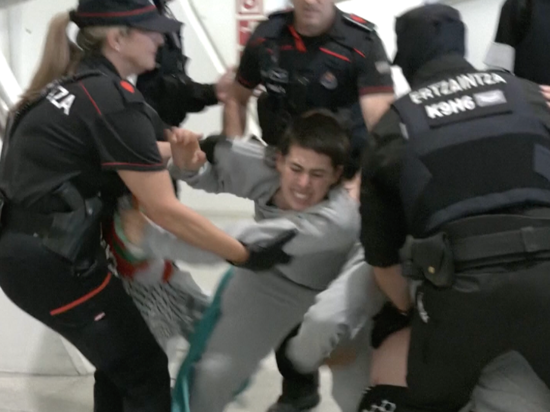 Police beat and detain Gaza flotilla activists at airport | Israel-Palestine conflict