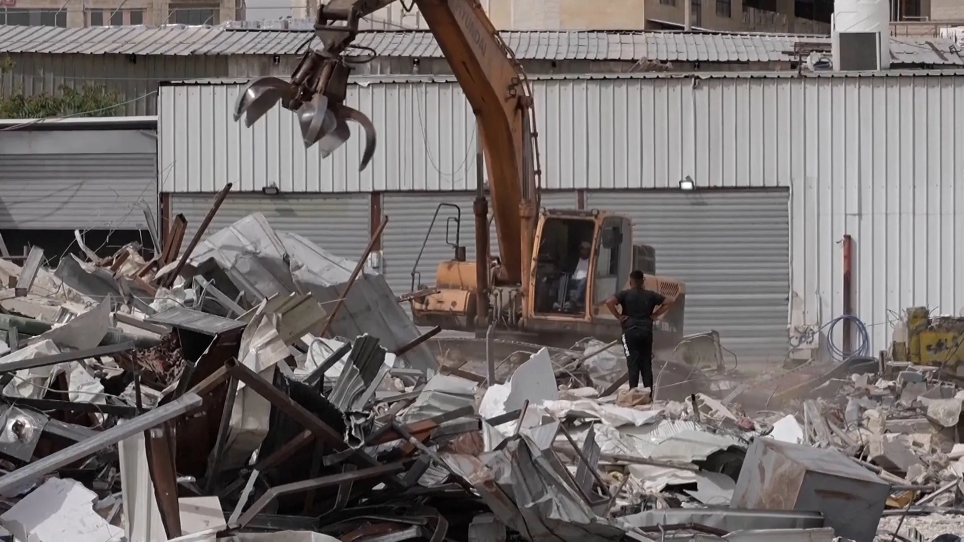 Israel bulldozes Palestinian shops to make way for settlement-linked road | Occupied West Bank