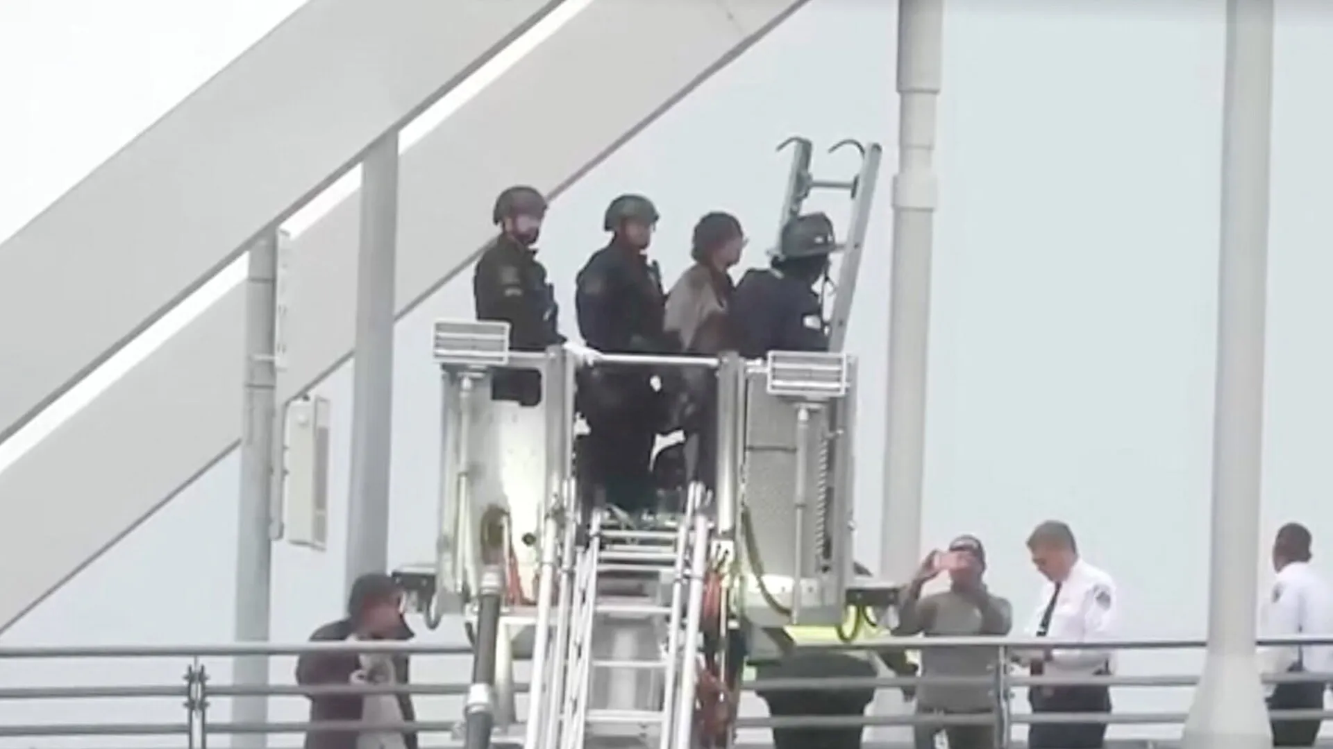 Police arrest protester after five-days atop Washington bridge | US-Israel war on Iran