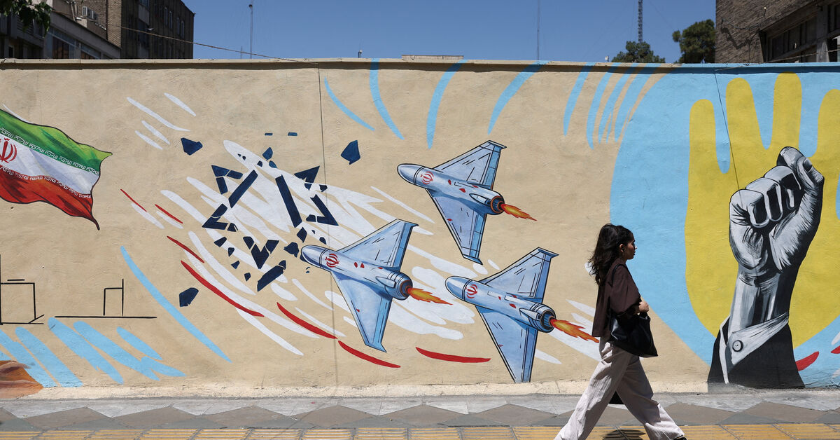 US says it struck Iranian military sites, Tehran responds with air base attack