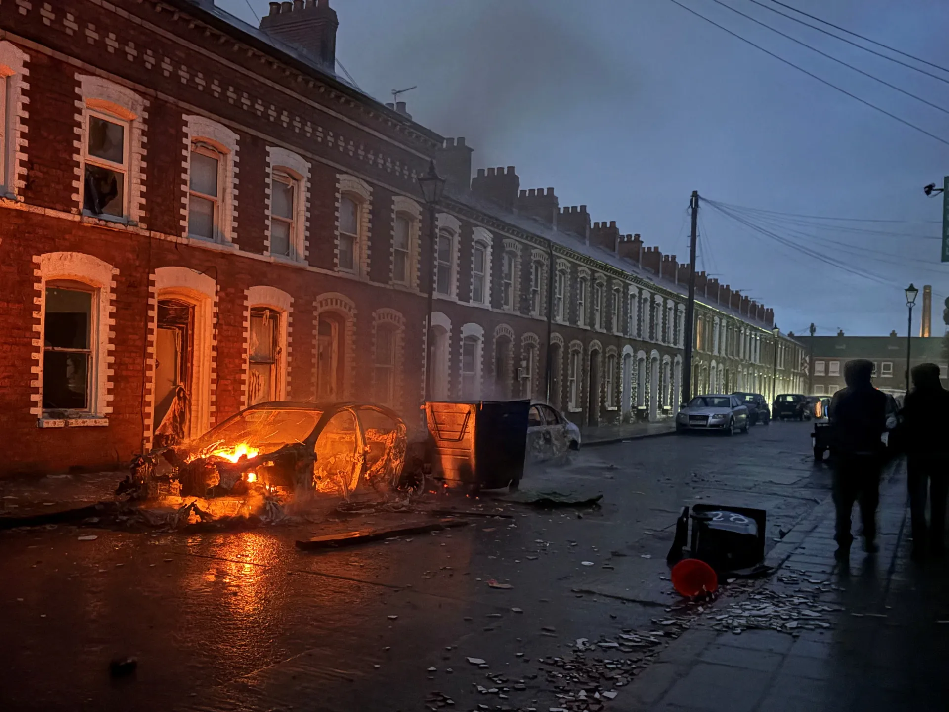 Protesters torch cars, buildings in Belfast after knife attack | News