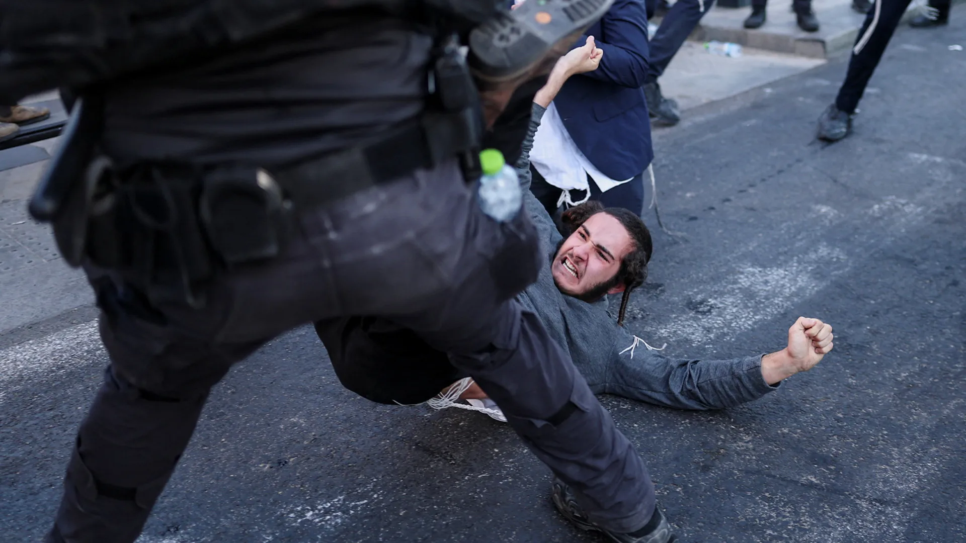 Ultra-Orthodox protesters clash with Israeli police over army draft | Protests