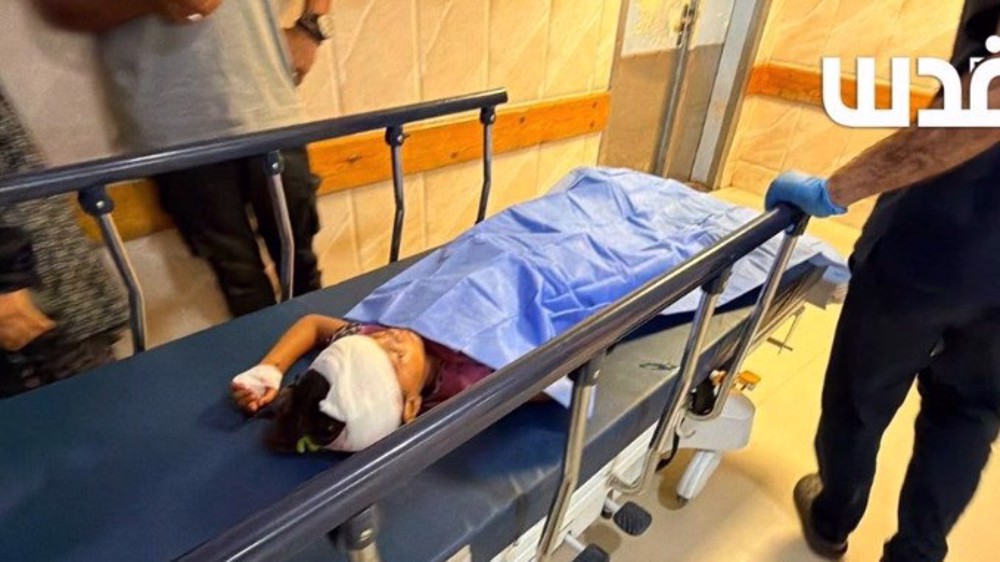 Israeli attacks kill at least 13 Palestinians in Gaza, including an entire family
